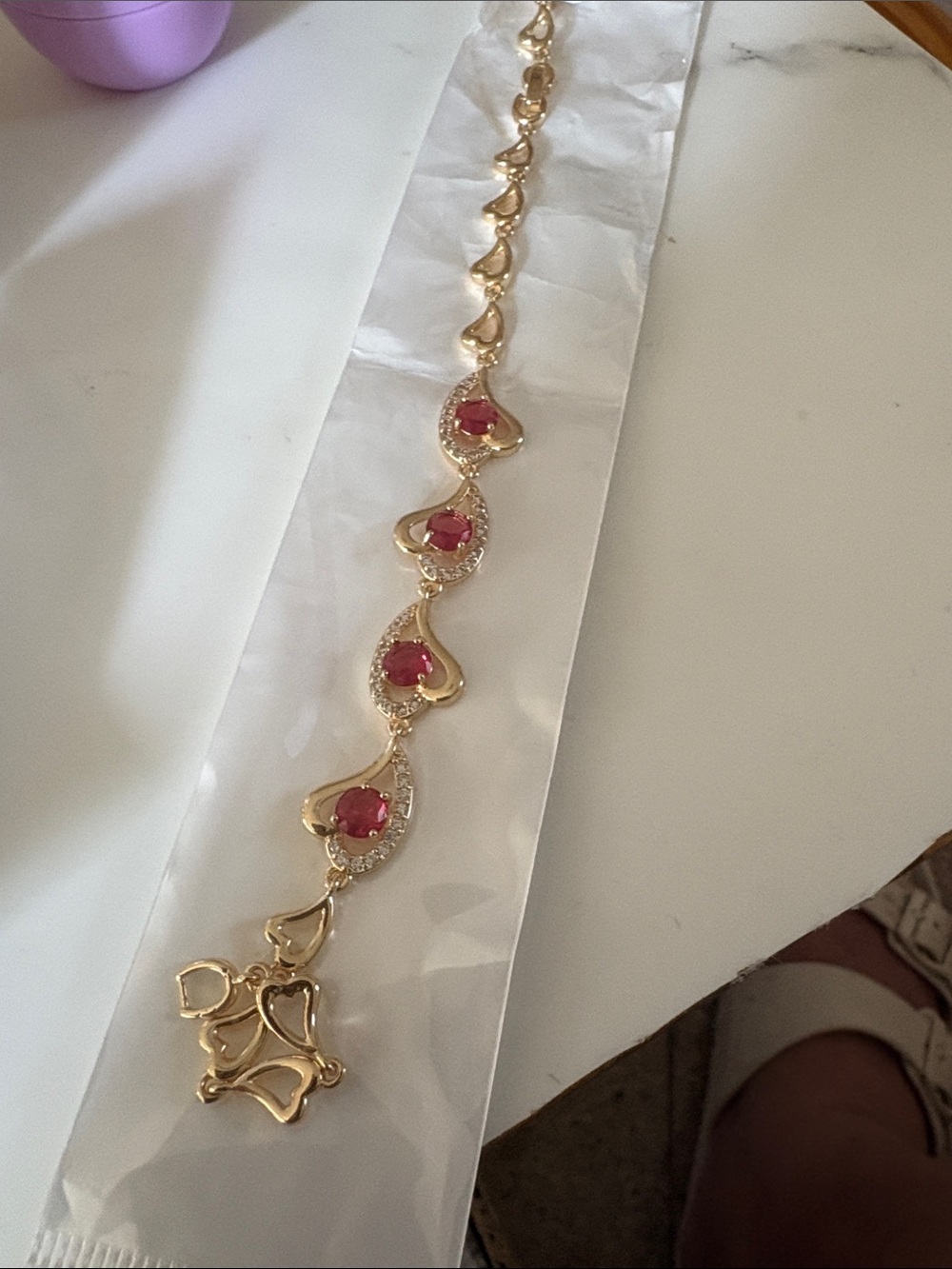 Gold-Tone Bracelet with Pink Gem Accents